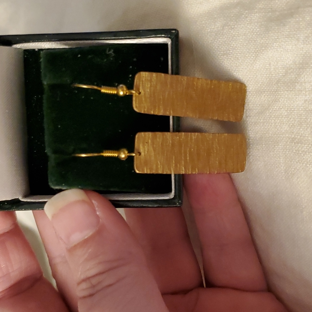 Textured yellow metal slices.
